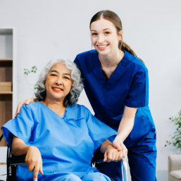caregiver and senior smiling