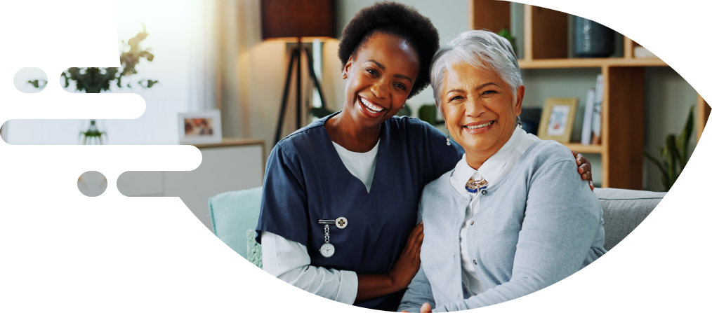 caregiver and senior smiling