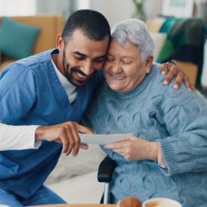 caregiver and senior smiling