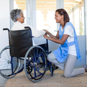 caregiver giving assistance to senior