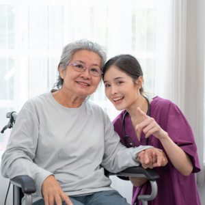 caregiver and senior smiling