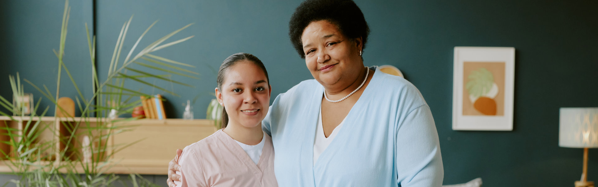 caregiver and senior smiling