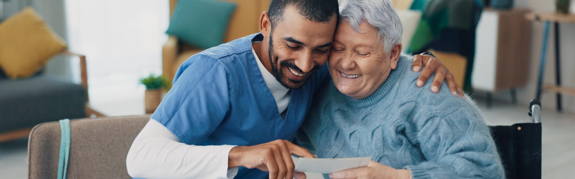 caregiver and senior smiling