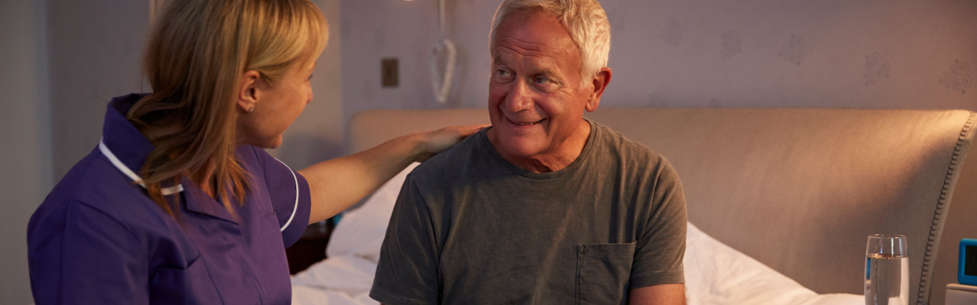 caregiver comforting senior