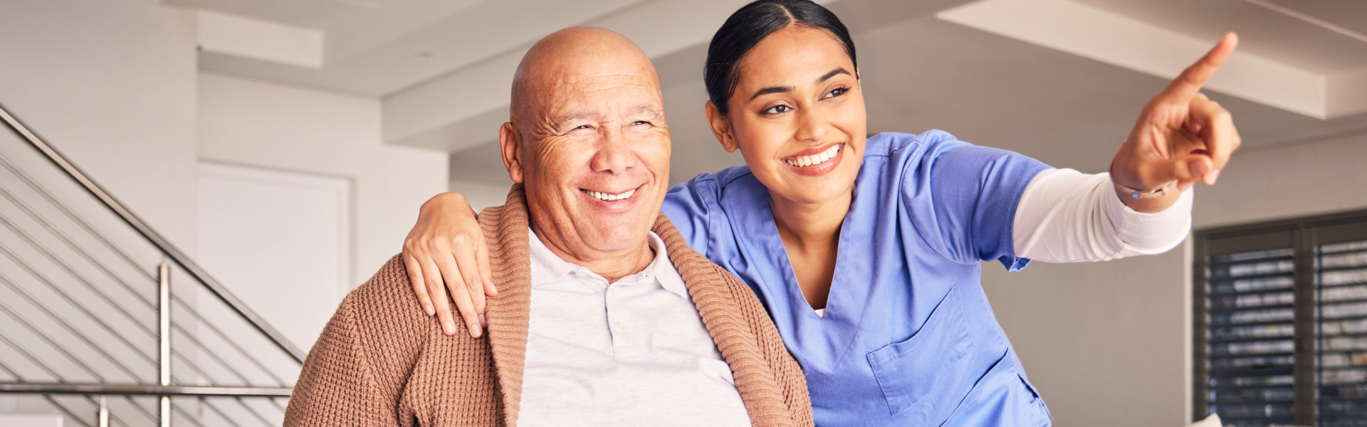 caregiver and senior smiling